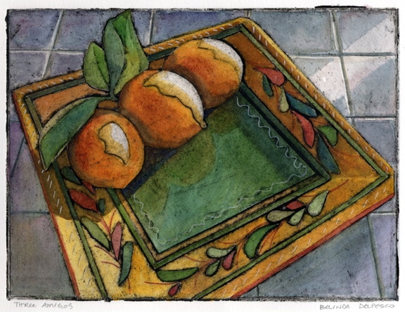 a collagraph print of three lemons on a plate, painted with watercolor