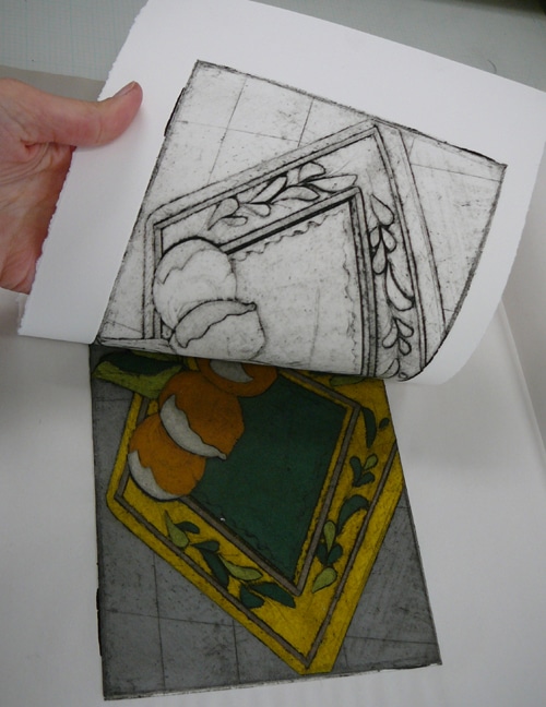 a collagraph pring getting pulled after a trip through the etching press