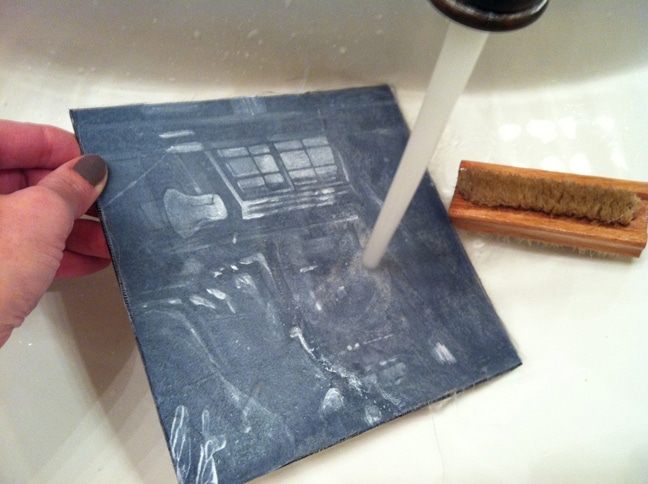 rinsing a sealed silk aquatint plate after printing