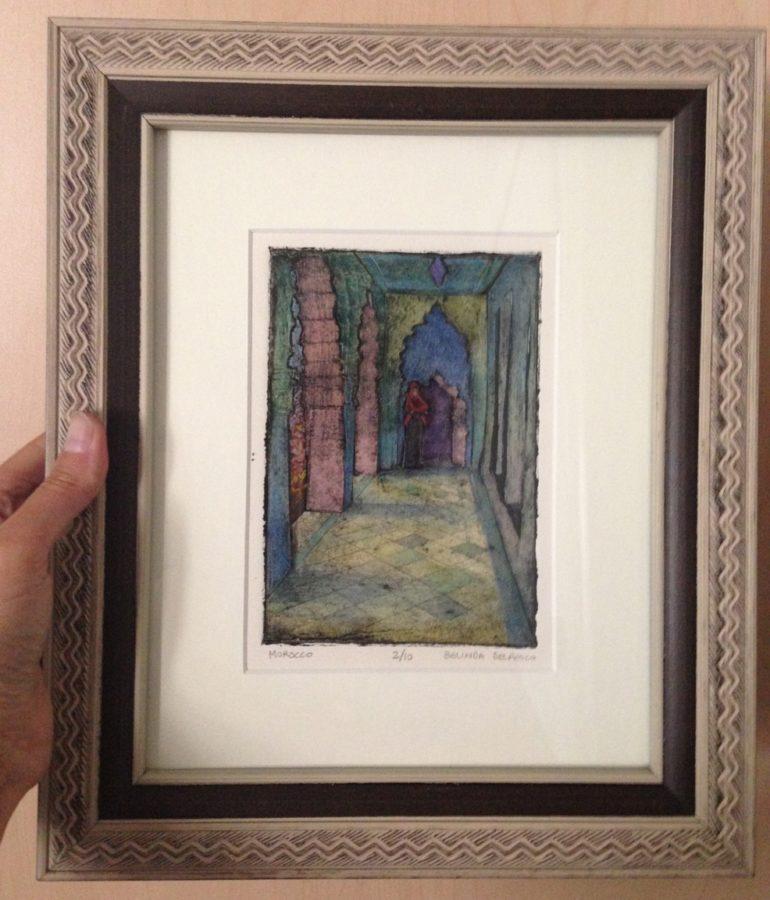 a framed collagraph print with watercolor, showing a moroccan arcade
