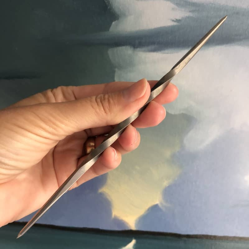 An etching needle, also called a twisted scribe