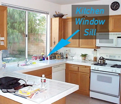 a kitchen with a large window