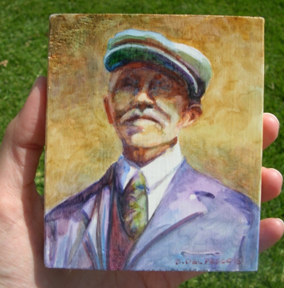 a small portrait of a man with a big white moustache and a cap on his head, and a suit and tie, from the shoulders up, done in watercolor