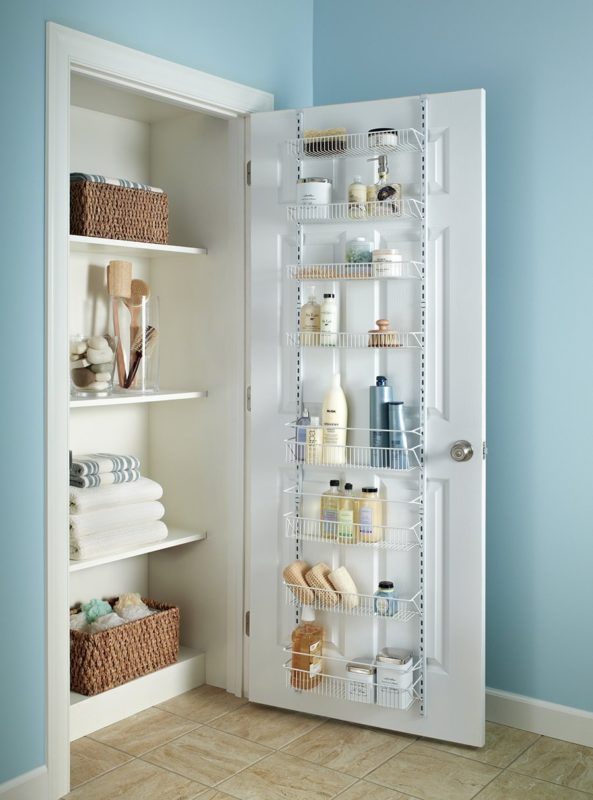 a door mounted closet caddy with shallow shelves to post inside a closet for for added storage
