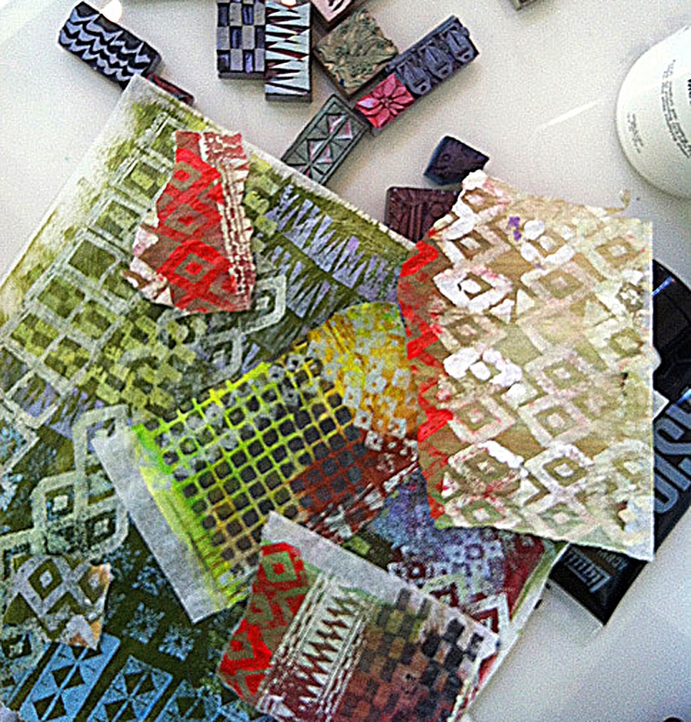 torn paper collage preparation, with Lineco tissue paper and acrylic paint, painted onto the tissue, and then stamped with hand carved rubber stamps.